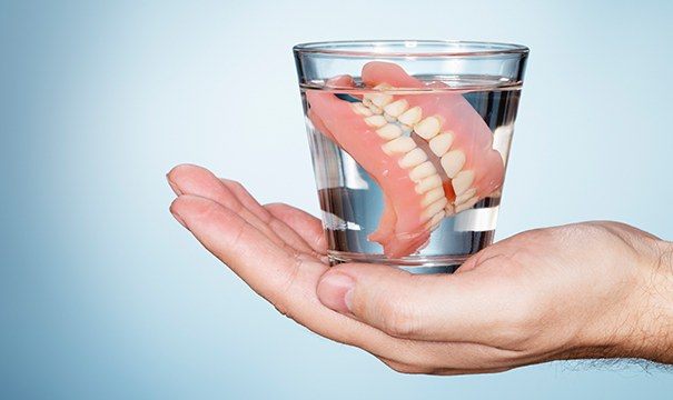 dentures in water glass