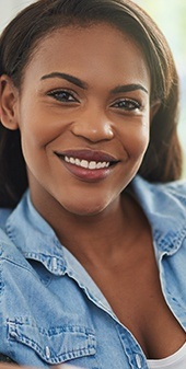 Woman with healthy smile after periodontal treatment