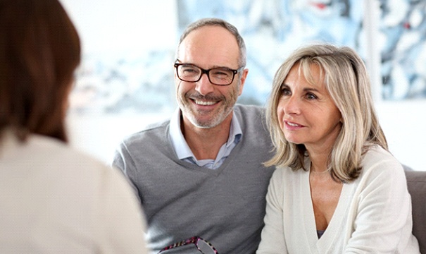 couple at a dental implant consultation