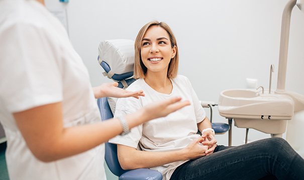 patient talking to dentist 