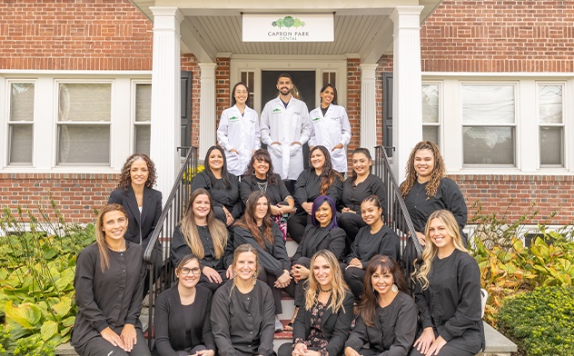 Attleboro dental team standing outside of dental office building