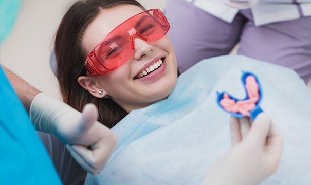 girl getting fluoride treatment