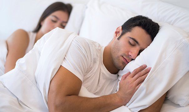 Man sleeping soundly with nightguard