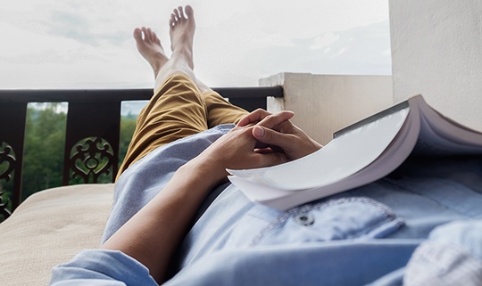 Attleboro patient resting at home after tooth extraction