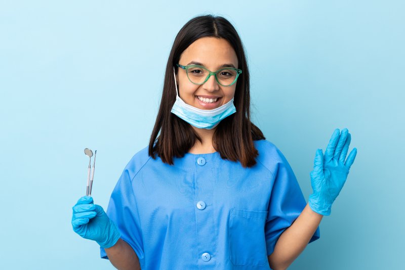 Dentist in Attleboro waving