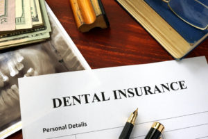Dental insurance benefit form on desk