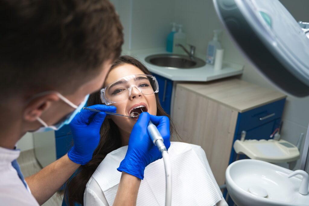 Woman in dental chair undergoing root canal